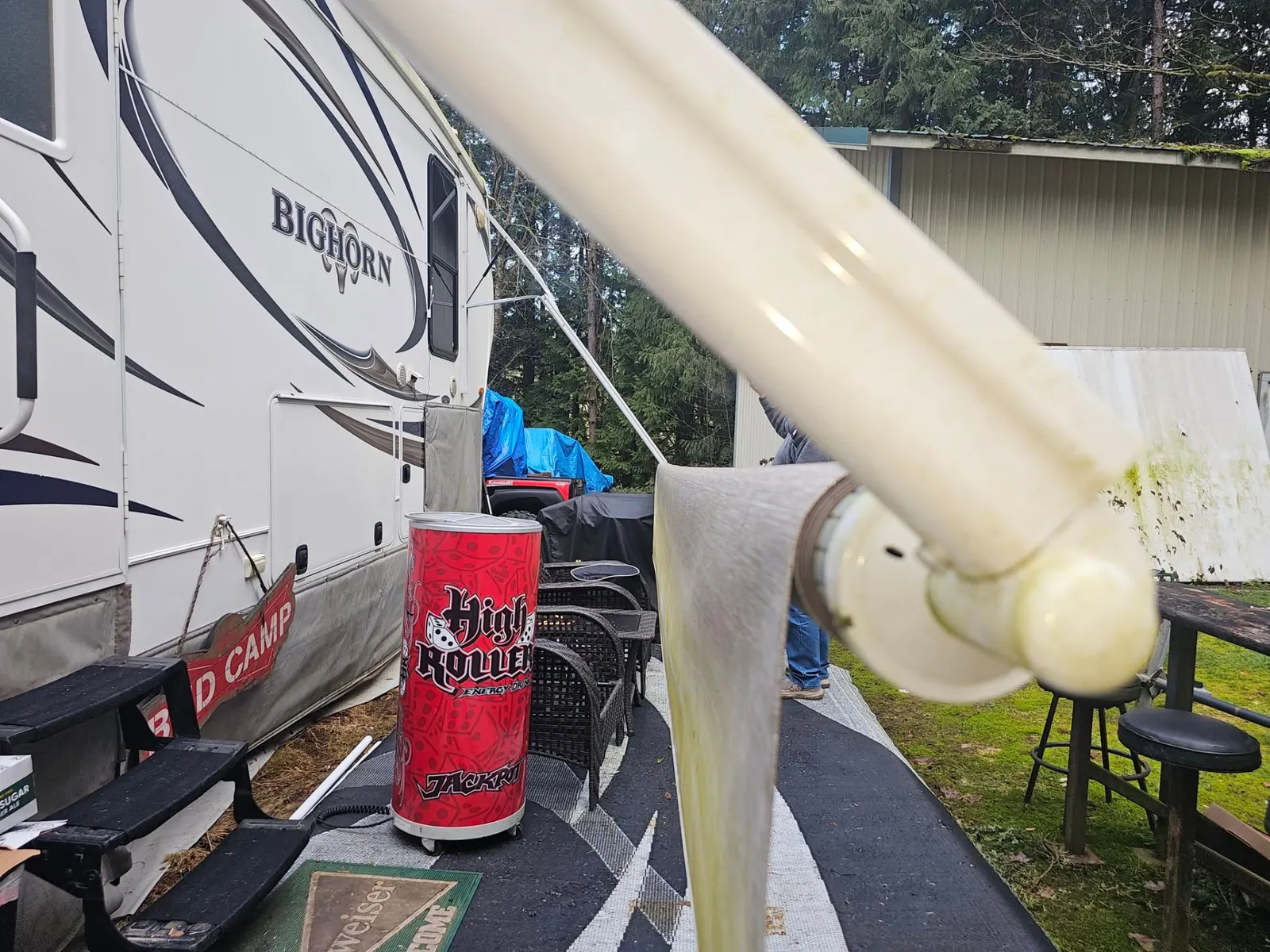 Awning arm being worked on at a Bighorn fifth wheel