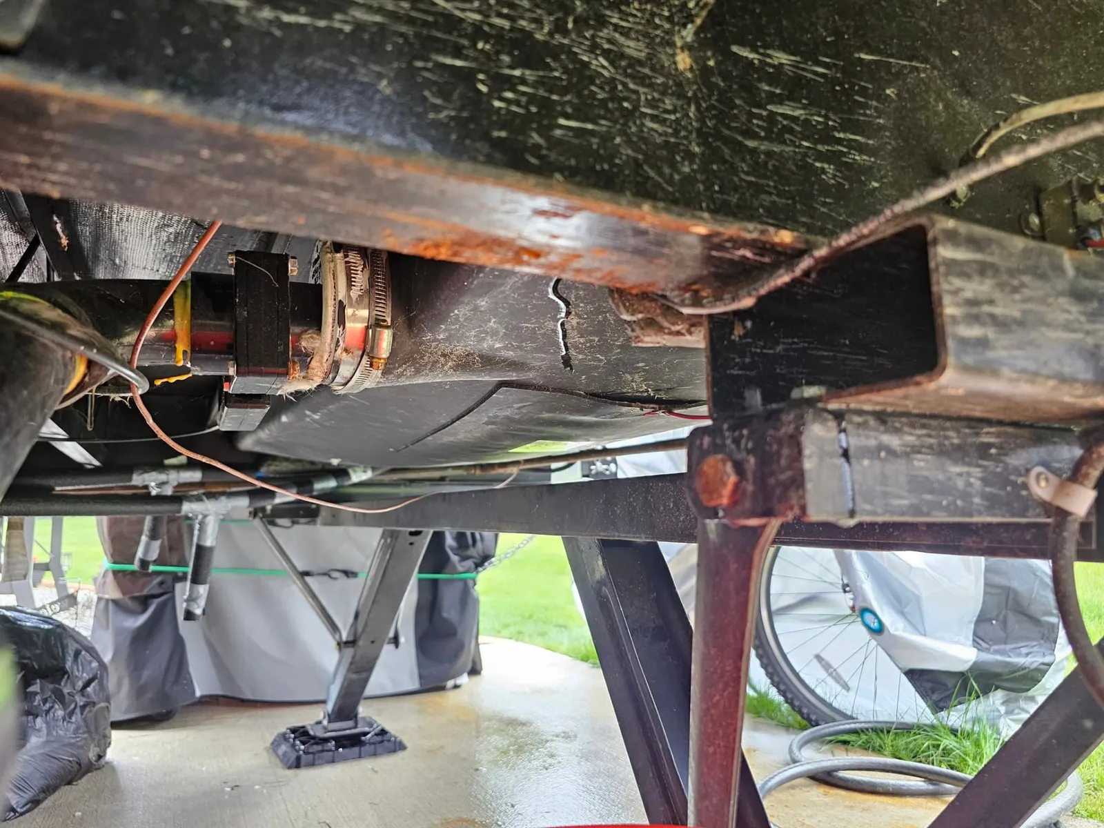 Underside of an RV frame during a chassis and underbelly inspection